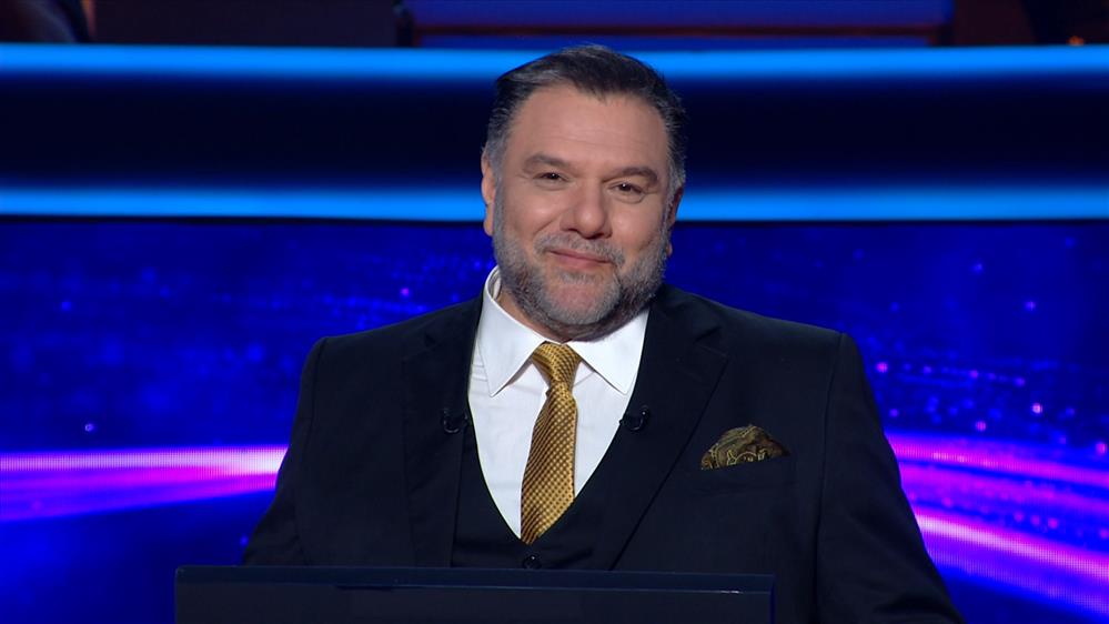 ΠΟΙΟΣ ΘΕΛΕΙ ΝΑ ΓΙΝΕΙ ΕΚΑΤΟΜΜΥΡΙΟΥΧΟΣ; - ΕΠΕΙΣΟΔΙΟ 128 – 3η ΣΕΖΟΝ

